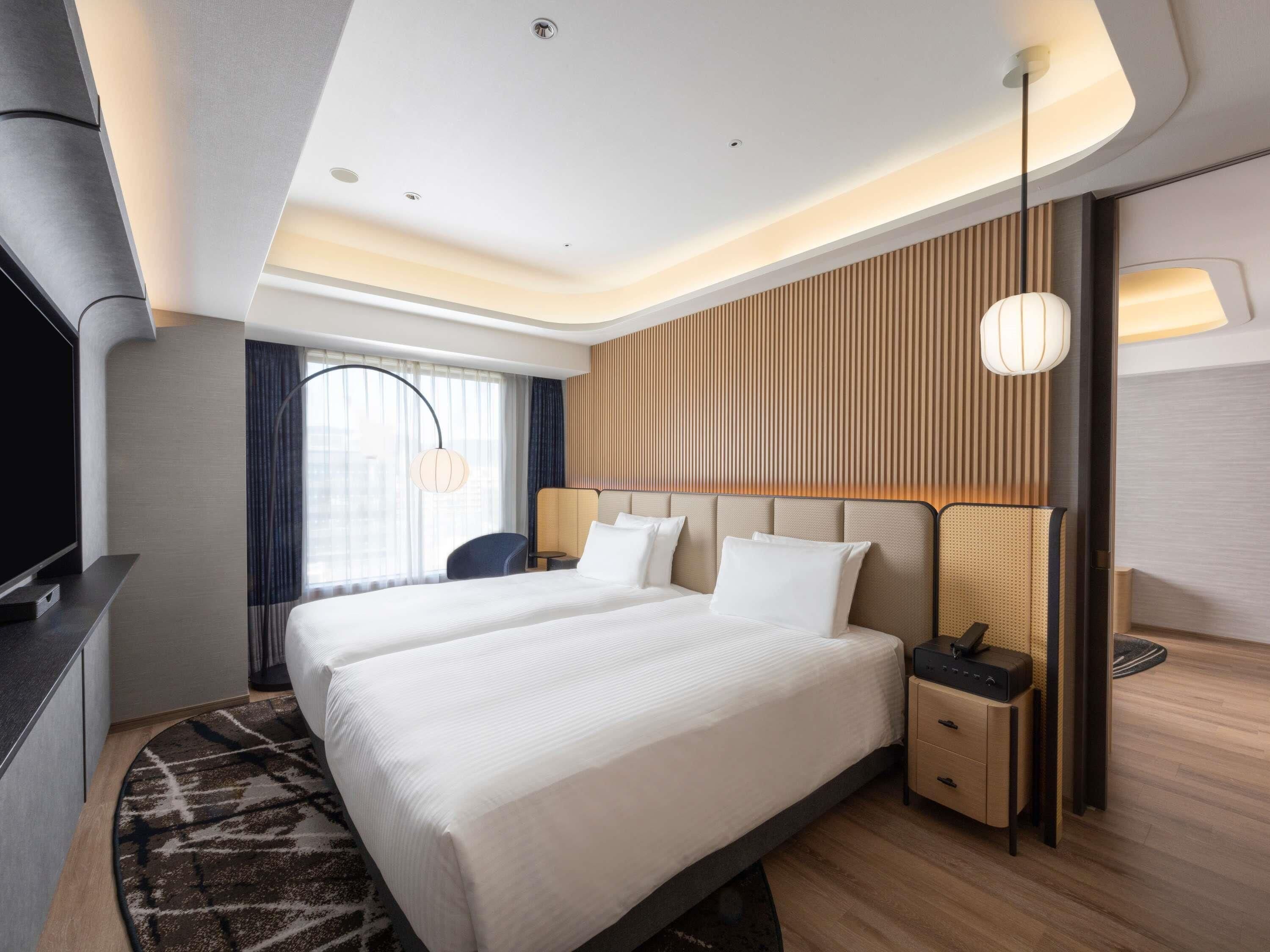 Junior suite, 2 eenpersoonsbedden, niet-roken, toegang tot de clublounge (Executive) | Hypoallergeen beddengoed, een kluis op de kamer