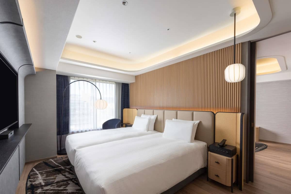 Suite Junior, 2 lits jumeaux, non-fumeur, accès au bar-salon (Executive) | Literie hypoallergénique, coffre-fort, rideaux d’obscurcissement