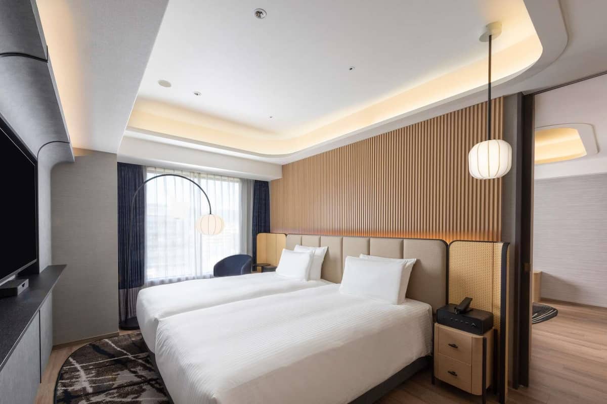 Suite Junior, 2 lits jumeaux, non-fumeur, accès au bar-salon (Executive) | Literie hypoallergénique, coffre-fort, rideaux d’obscurcissement