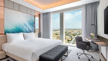 Suíte executiva, 1 cama King | Roupas de cama premium, frigobar, cofres nos quartos, cortinas blackout