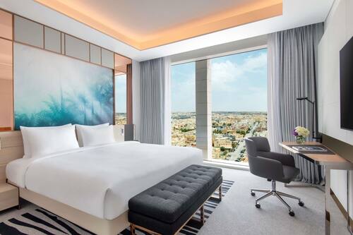 Executive Suite, 1 King Bed | Premium bedding, minibar, in-room safe, blackout drapes