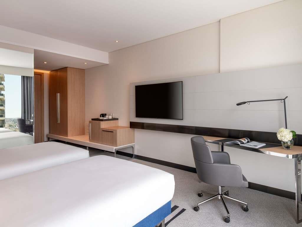 Ropa de cama de alta calidad y minibar 