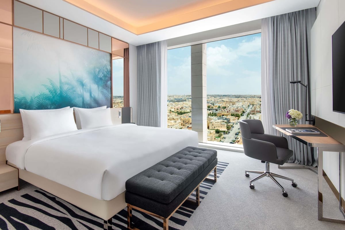 Executive Suite, 1 King Bed | Premium bedding, minibar, in-room safe, blackout drapes