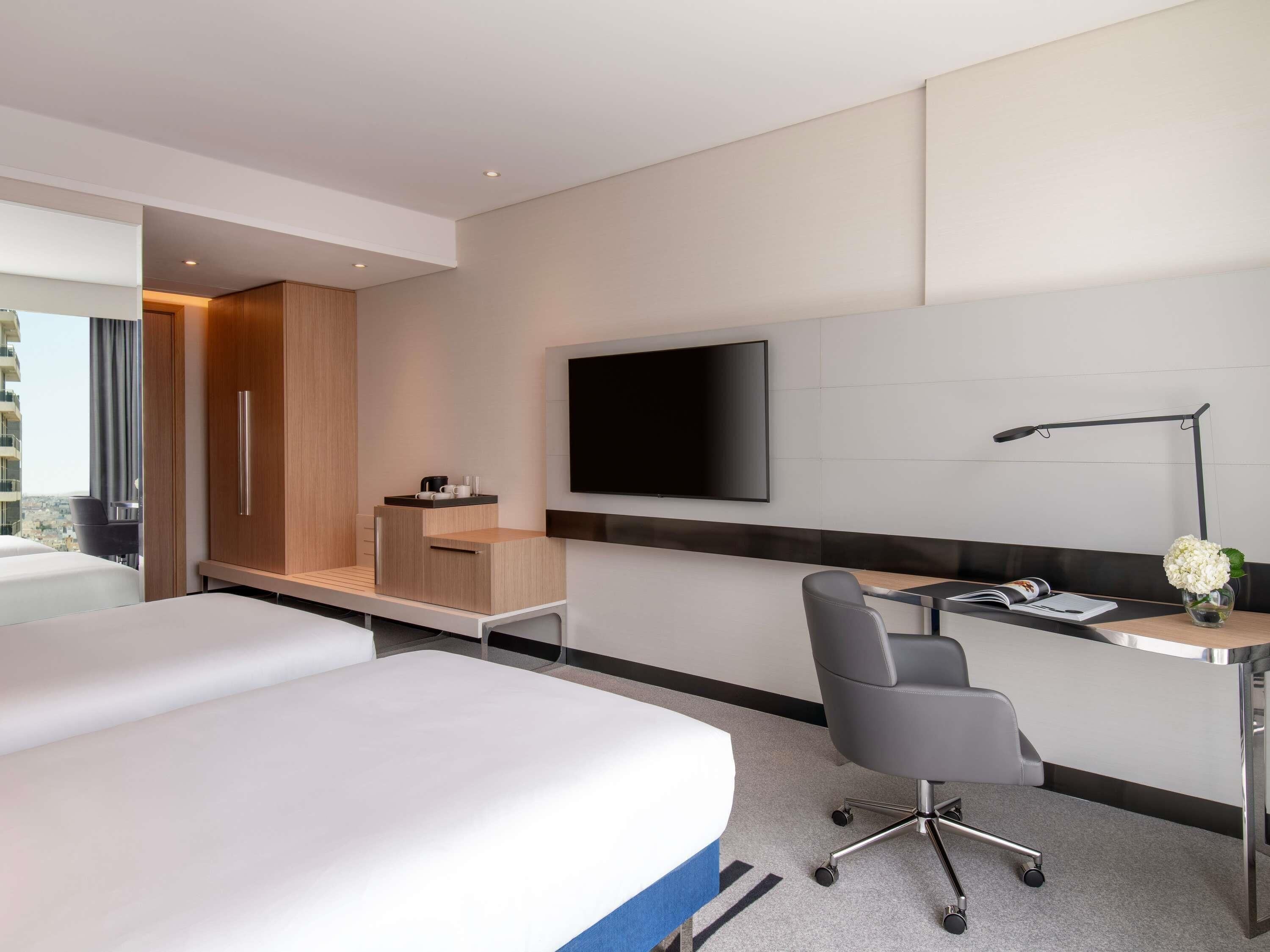 Ropa de cama de alta calidad y minibar 
