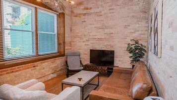 Luxury Condo | Living area | TV