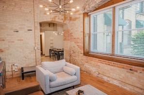 Luxury Condo | Living area | TV - Waterfront 2BDR Condo in Grand Haven 110 (Grand Haven)