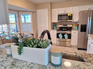 Fridge, microwave, oven, stovetop - Luxury Cape Escape Pool Home Fully Loaded! (Cape Coral)