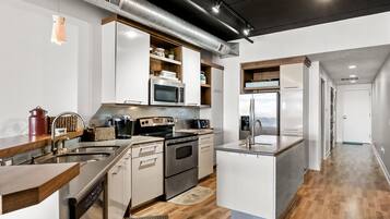 Luxury Condo | Private kitchen | Fridge, microwave, dishwasher, rice cooker