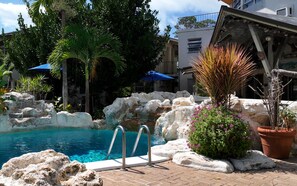 Outdoor pool, pool umbrellas, pool loungers