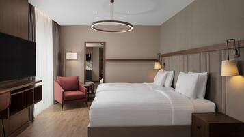 Premium bedding, down comforters, minibar, in-room safe