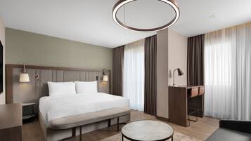 Premium bedding, down comforters, minibar, in-room safe