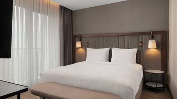 Suite, 1 Bedroom, Sea View | Premium bedding, down duvets, minibar, in-room safe