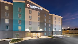 A multi-story hotel with a modern design, featuring a prominent "Candlewood Suites" sign. - Candlewood Suites Chattanooga East Ridge by IHG (Chattanooga)