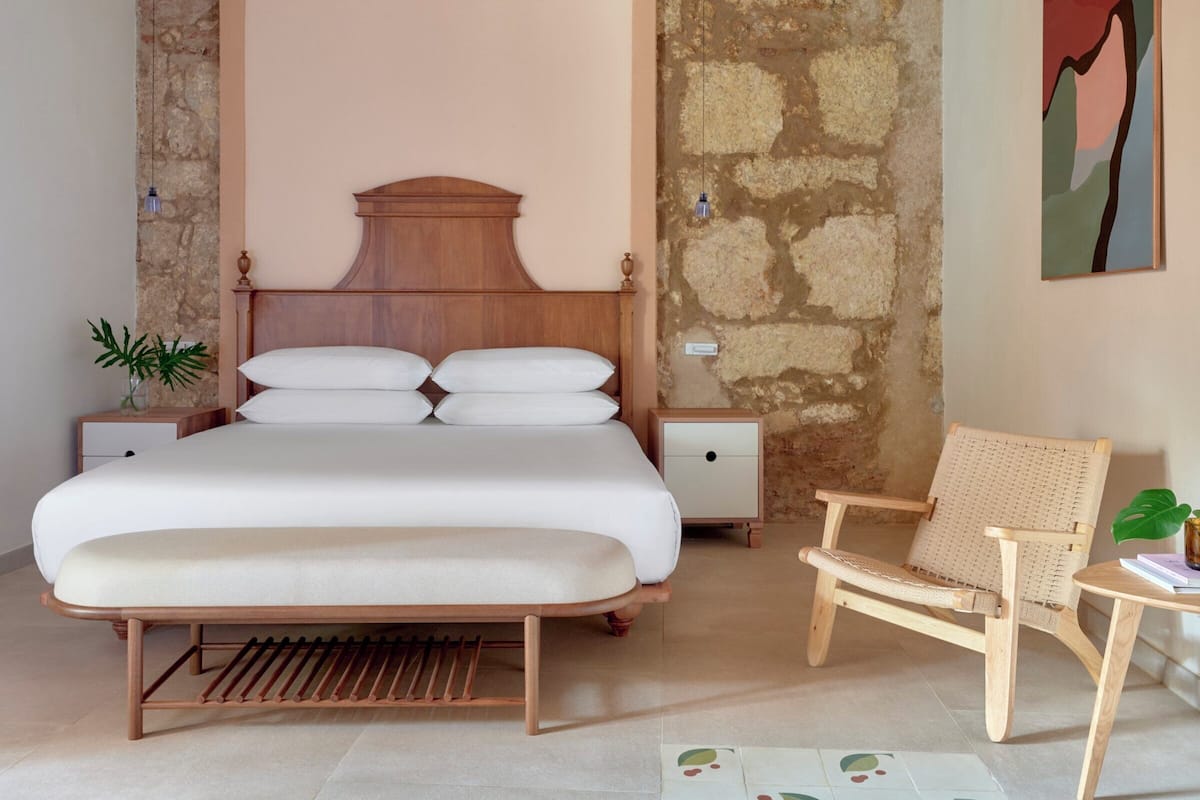 Suite, 1 King Bed (Colonial) | In-room safe, blackout drapes, soundproofing, iron/ironing board