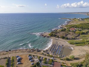 On the beach, sun-loungers, beach towels - Villa Astoria Luxury 
Premium Comfort With Great Care to Detail (Katakolo)