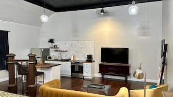 Romantic Loft, 1 King Bed, Non Smoking, Bathtub | Living area | 45-inch Smart TV with digital channels, books, streaming services