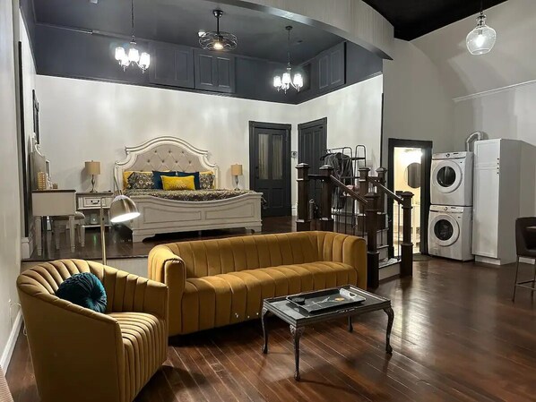 Romantic Loft, 1 King Bed, Non Smoking, Bathtub | Living area | 45-inch Smart TV with digital channels, books, streaming services - The Mercantile on the Katy Trail (Hermann)