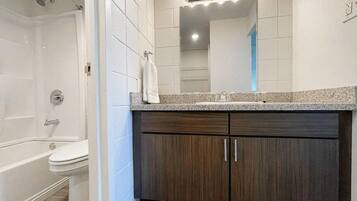 Hair dryer, towels, soap, shampoo