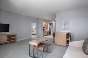 Suite, 1 chambre | Coin séjour