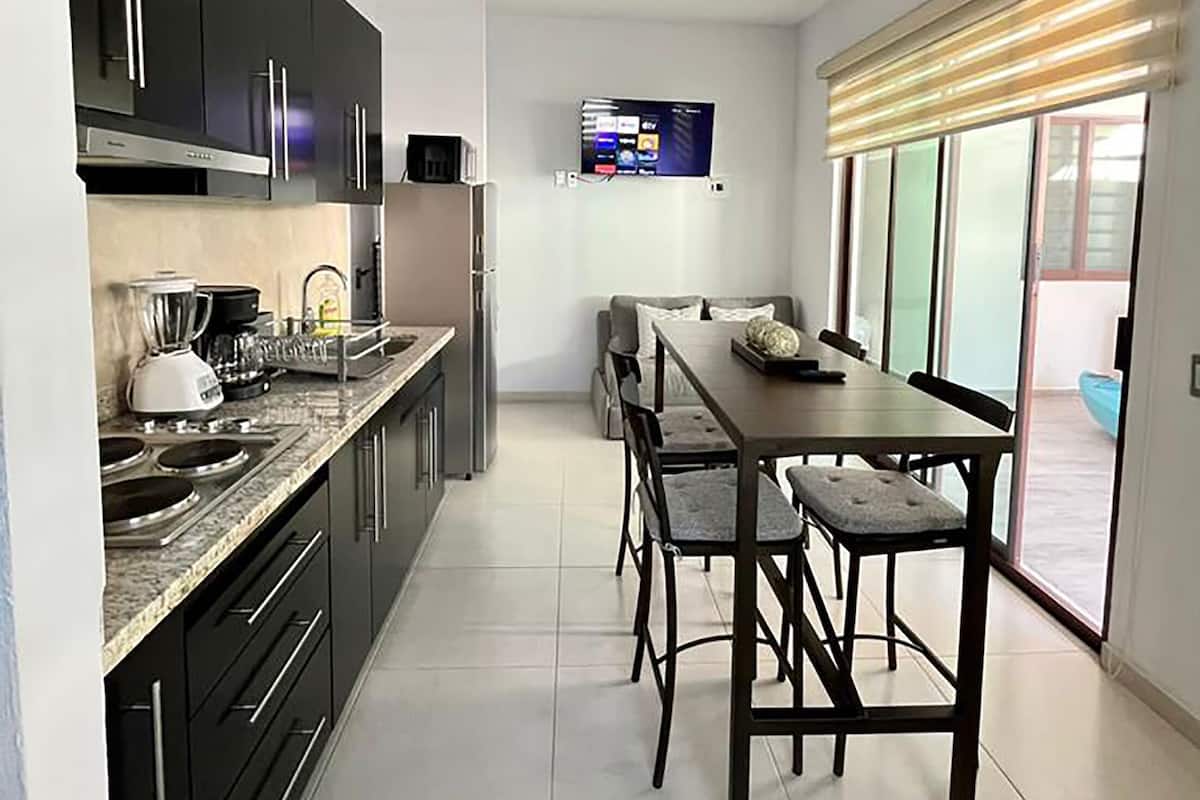 Basic Bungalow | Living area | 32-inch Smart TV with cable channels