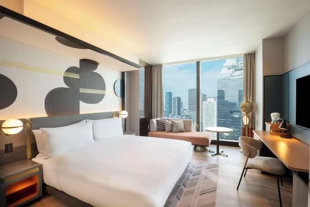 Premium bedding, down duvets, minibar, in-room safe