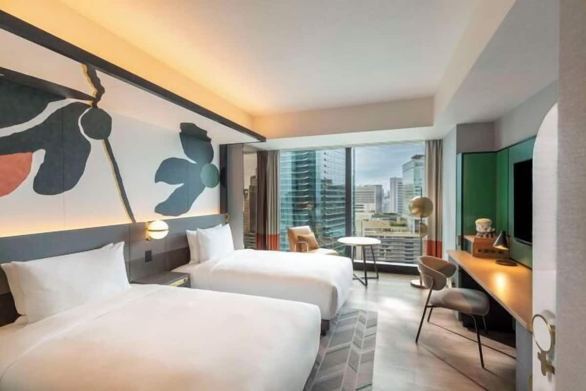 Premium bedding, down duvets, minibar, in-room safe