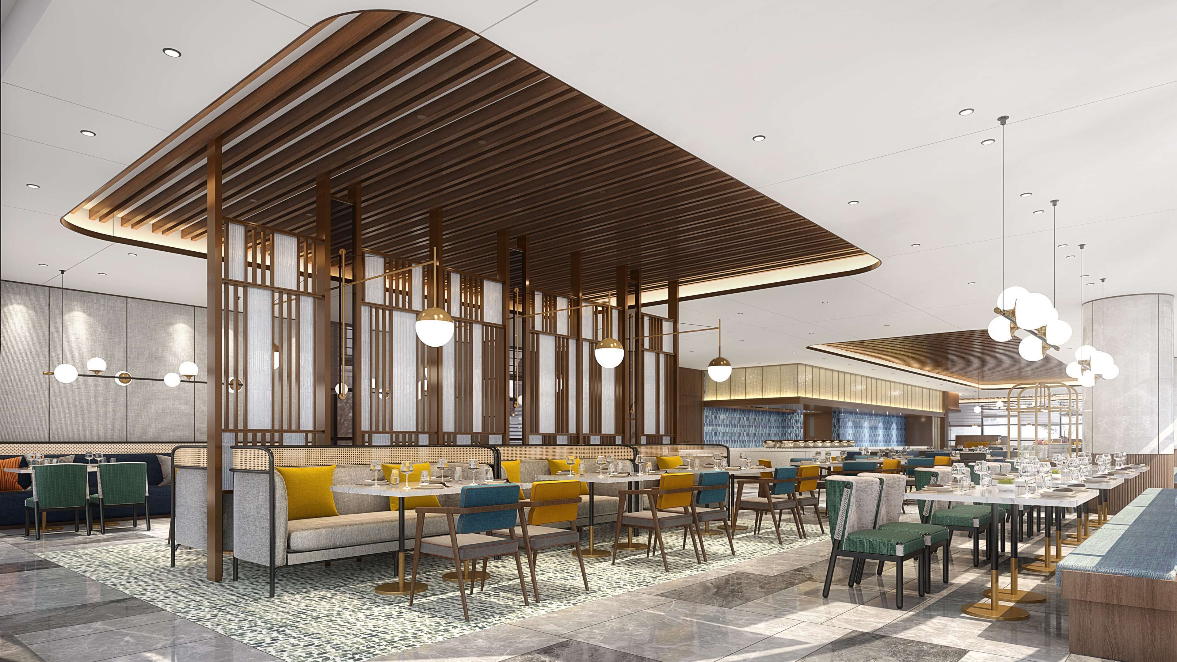 A spacious, modern restaurant with high ceilings, wooden slats, and a mix of seating options including tables and sofas.
