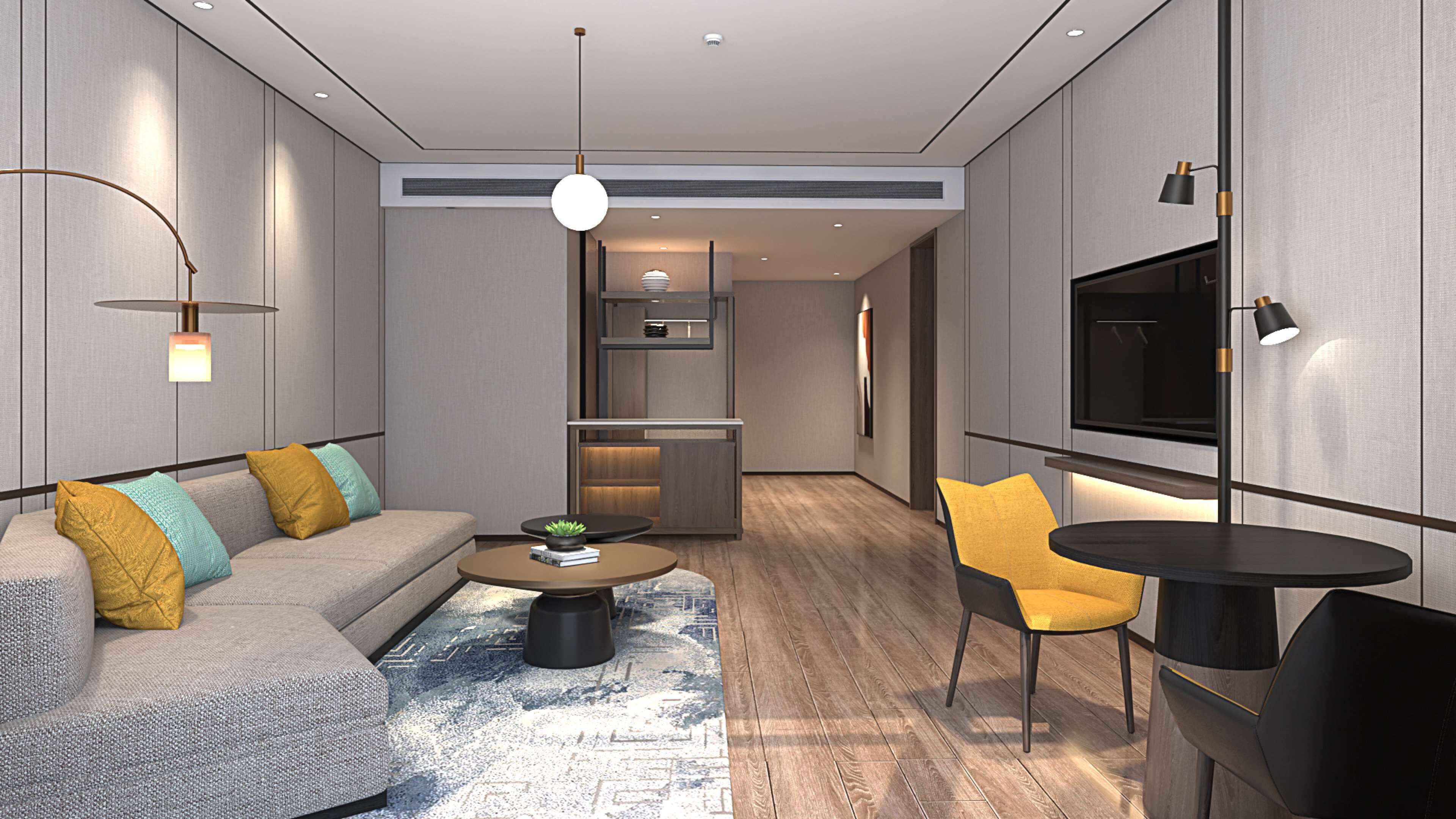 A modern living room with a sofa, coffee table, and a TV.