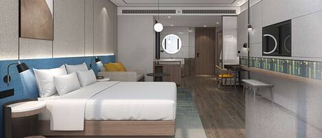 A modern hotel room with a large bed, bedside tables, a desk, and a mirror.