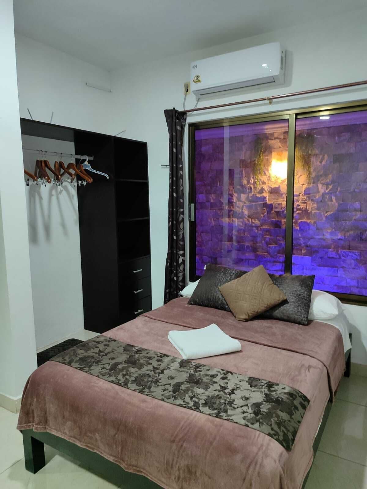 Family Apartment, 1 Bedroom | 1 bedroom, blackout drapes, iron/ironing board, free WiFi