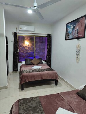 Family Apartment, 1 Bedroom | 1 bedroom, blackout curtains, iron/ironing board, free WiFi - Departamentos Chan Kiin (Valladolid)