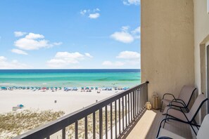 On the beach, sun loungers, beach towels