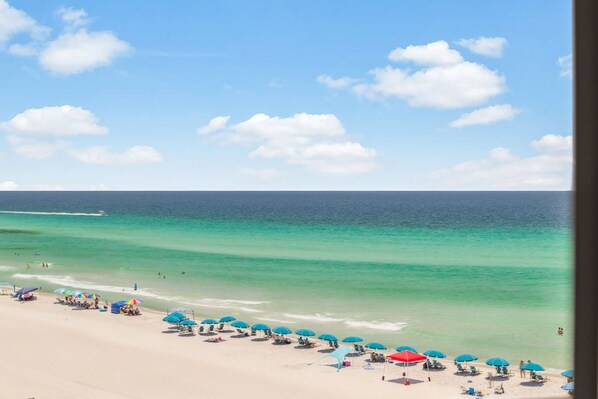 On the beach, sun loungers, beach towels