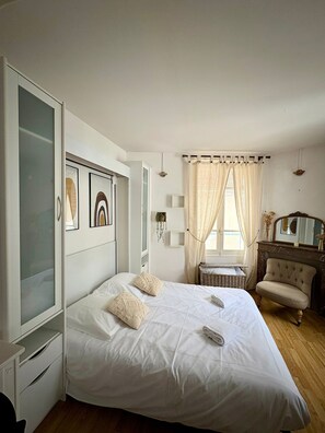 1 habitación, tabla de planchar con plancha, wifi gratis y ropa de cama 