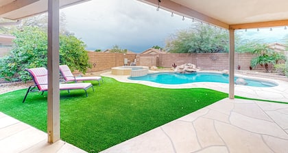 Desert charmer with enclosed yard, heated pool, smart TVs, W/D, & full kitchen