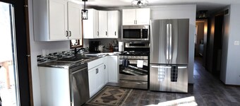 Lake front, HUGE yard and deck, walking distance to the heart of Okoboji