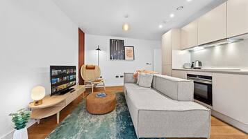 Executive Apartment | Living area | Smart TV, Netflix, heated floors, streaming services