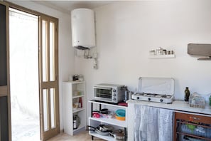 Quarto quádruplo conforto | Cozinha compartilhada | Geladeira grande, máquina de café expresso, cafeteira/chaleira