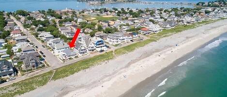 On the beach, sun loungers, beach towels