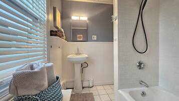 Hair dryer, towels, soap, shampoo