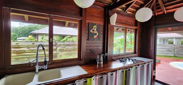 Fridge, stovetop, espresso maker, coffee/tea maker