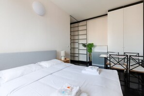 1 habitación, tabla de planchar con plancha, wifi y ropa de cama 