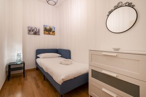 2 habitaciones, tabla de planchar con plancha, wifi y ropa de cama 