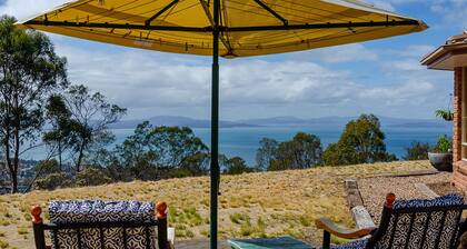Elevated Retreat: 100+ Acres with Stunning Water Views; refreshing and blissful!