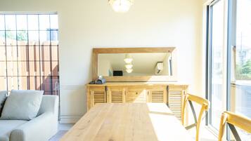 Family Quadruple Room, Multiple Beds, Mountain View | Living area | Flat-screen TV