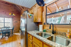 Fridge, microwave, oven, stovetop - Dog friendly creek-front cabin, private hot tub, game room, water views, firepit (Blairsville)