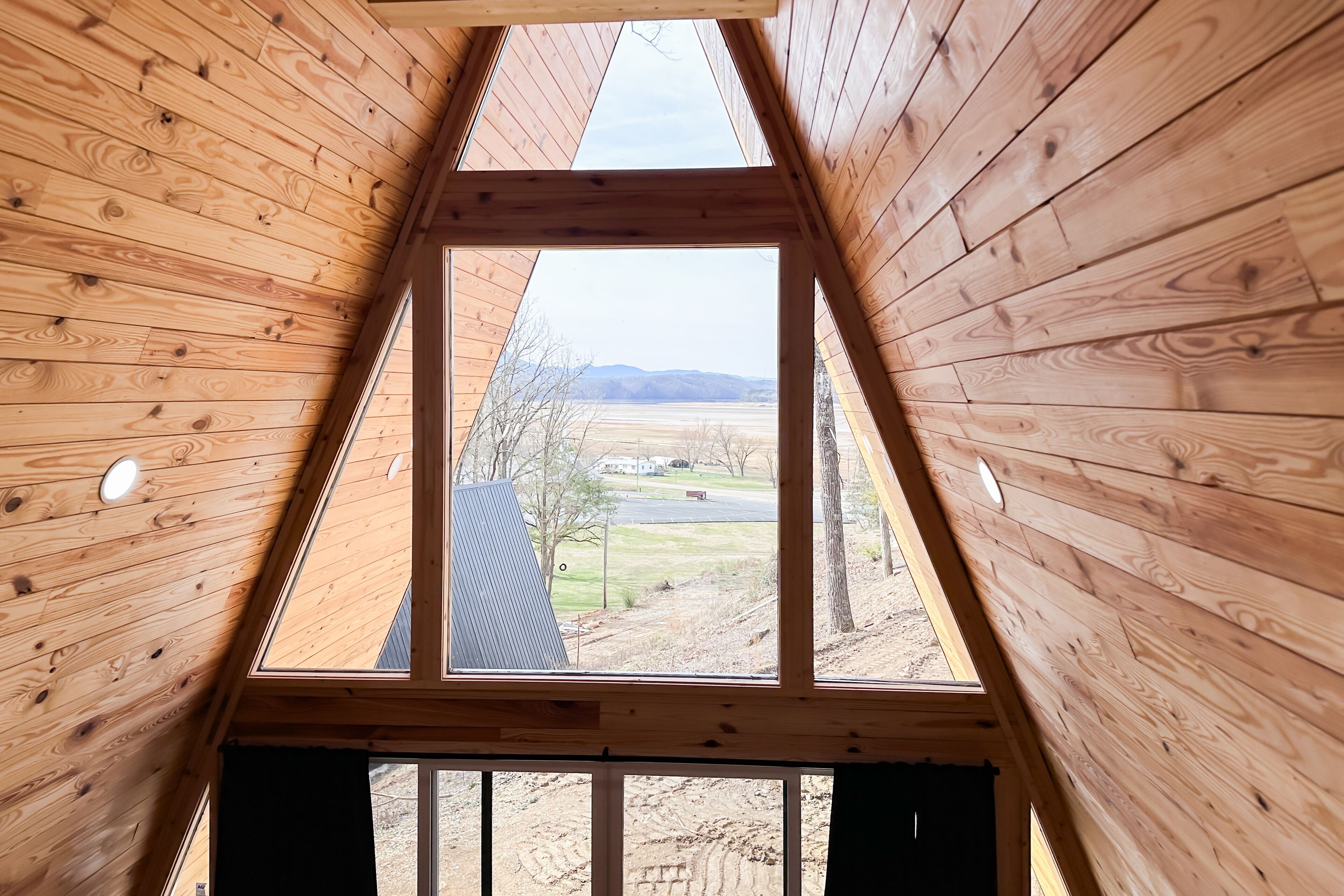 Dog-friendly A-frame cabin with loft, balcony, full kitchen, & washer/dryer