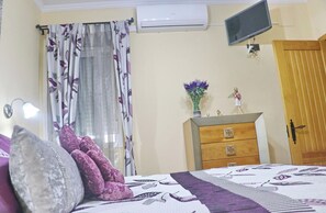 2 quartos, ferros/tábuas de passar roupa