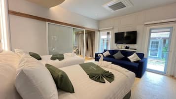 Family Room, 2 Bedrooms | Down duvets, free minibar items, desk, laptop workspace