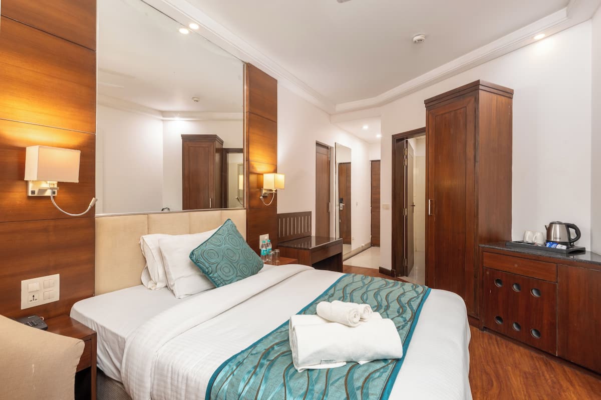 Family Room, 2 Bedrooms, Garden View | Down duvets, desk, laptop workspace, iron/ironing board